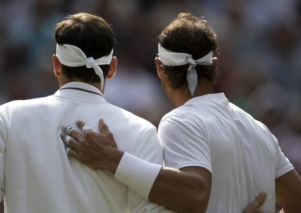 (190713) -- LONDON, July 13, 2019 -- Roger Federer (L) of Switzerland and Rafael Nadal of Spain pose for a photo before their men s singles semi-final match at the 2019 Wimbledon Tennis Championships in London, Britain, on July 12, 2019. Roger Federer won 3-1. ) (SP)BRITAIN-LONDON-TENNIS-WIMBLEDON-DAY 11 HanxYan 