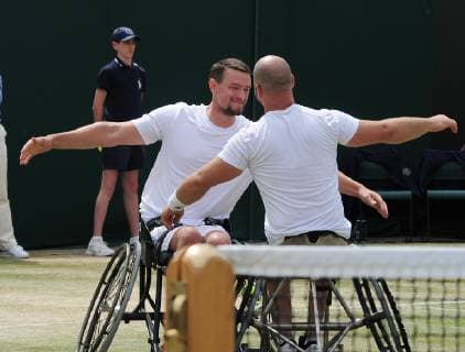 Tennis - 2019 Wimbledon Championships - Week Two, Saturday (Day Twelve) Men s Final of the Wheelchair doubles Alfie Hewett and Gordon Reid (GBR) v Joachim Gerard (BEL) v Stefan Olsson (SWE) Joachim Gerard v Stefan Olsson celebrate winning match point on Court 3. COLORSPORT ANDREW COWIE 