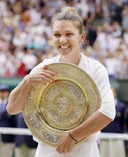 Tennis: Wimbledon championships Simona Halep of Romania celebrates her first Wimbledon title on July 13, 2019. 