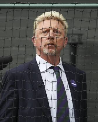 TV commentator Boris Becker stands behind a fence at the Centre Court Tennis Wimbledon 2016 Grand Slam ITF ATP WTA AELTC London Great Britain 14 July 2019 Copyright: xJuergenxHasenkopfx