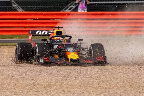 14th July 2019; Silverstone Circuit, Northampton, England; FIA F1 Grand Prix of Britain, Race Day; Aston Martin Red Bull Racing driver Max Verstappen bounces through the gravel after being hit by Scuderia Ferrari driver Sebastian Vettel  ActionPlus12153794 TimxWilliams