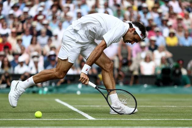 Sport Bilder des Tages 14th July 2019, The All England Lawn Tennis and Croquet Club, Wimbledon, England, Wimbledon Tennis Tournament, Day 13; Roger Federer (SUI) cannot return a drop shot from Novak Djokovic (SER)  ActionPlus12153810 ShaunxBrooks
