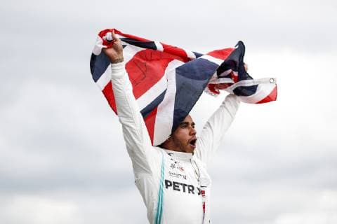 July 14, 2019 - Towcester, Great Britain - LEWIS HAMILTON of Mercedes AMG Petronas Motorsport celebrates after winning the Formula 1 British Grand Prix at Silverstone Circuit. F1 2019: British Grand Prix: Hamilton Wins  - ZUMAtish 20190714_mda_g147_255 Copyright: xJamesxGasperottix