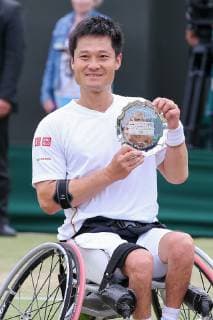Shingo Kunieda of Japan poses with the trophy after the men s wheelchair singles final match of the Wimbledon Lawn Tennis Championships against Gustavo Fernandez of Argentina at the All England Lawn Tennis and Croquet Club in London, England on July 14, 2019.  (107962208)
