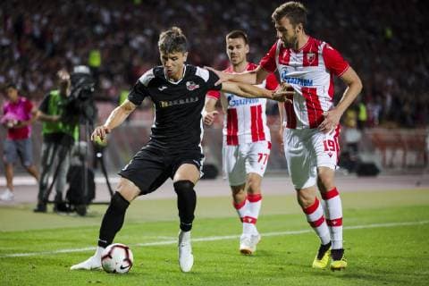 16th July 2019; Rajko Miti& x107; Stadium, Belgrade, Serbia; Champions League football, Red Star Belgrade versus FK Suduva; Topcagic of Suduva holds off the challenge for the ball from Milunovic of Red Star Belgrade  ActionPlus12154179 NikolaxKrstic