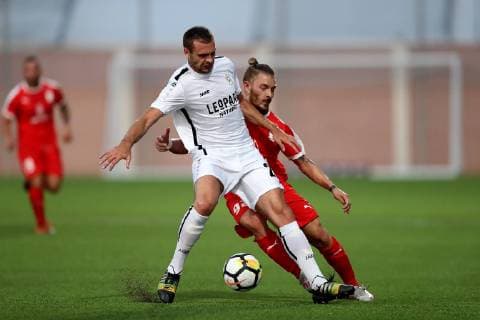 F91 Dudelange s Mickael Garos (L) is challenged by Kevin Tulimieri (R) of Valletta FC during the UEFA Champions League, First Qualifying Round, 2nd leg match between the two teams at the Centenary Stadium, Ta Qali, Malta on 16 July, 2019. Valletta FC v Dudelange UCL_19_20