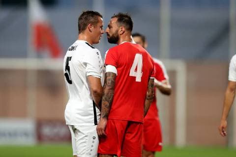 F91 Dudelange captain Tom Schnell (L) and Valletta FC captain Steve Borg (R) in a heated moment during the UEFA Champions League, First Qualifying Round, 2nd leg match between the two teams at the Centenary Stadium, Ta Qali, Malta on 16 July, 2019. Valletta FC v Dudelange UCL_19_20