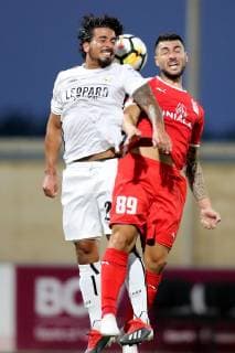 F91 Dudelange s Mehdi Kirch (L) and Valletta FC s Mario Fontanella (R) vie for an aerial ball during the UEFA Champions League, First Qualifying Round, 2nd leg match between the two teams at the Centenary Stadium, Ta Qali, Malta on 16 July, 2019. Valletta FC v Dudelange UCL_19_20