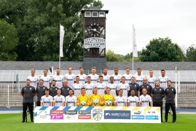 FC Carl Zeiss Jena Season 2019 2020 Team Photo Photo Photo Session on 16 7 19 Team Photo Upper Row v left René Eckardt, Pierre Fassnacht, Dominik Bock, Patrick Schorr, Michael Schüler, Ole Käuper, Nico Hammann, Anton Donkor, Meris Skenderovic, Julian Günther Schmidt, Tim Kircher, Daniele Gabriele Middle Row v left Lukas Kwasniok Trainer , Lucca Strolz Co Trainer , Max Habereder Athletic Trainer , Bernd Lindrath TW Trainer , Max Gottwald, Kilian Pagliuca, Maximilian Rohr, Marian Sarr, Marius Grösch, Uwe Dern Team Leader , Fabian Carnarius Physiotherapist , Tim Rudolph Physiotherapist , Kenta Kambara Zeugwart front row v li Jannis Kübler, Niklas Jahn, Matthias Kühne, TW Flemming Niemann, TW Jo Coppens, Lukas Sedlak, Justin Schau, Eric Voufack, Maximilian Weiß Ernst Abbe Sportforschung, Maximilian Weiss Ernst Abbe Sportforschung, Uwe Dern Team Leader , Uwe Dern Team Leader