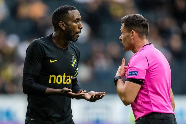 190717 Henok Goitom of AIK and referee Robert Hennessy during the UEFA Champions League qualifying match between AIK and Ararat Armenia on July 17, 2019 in Stockholm,  Copyright: ANDREASxLxERIKSSON BB190717AE011