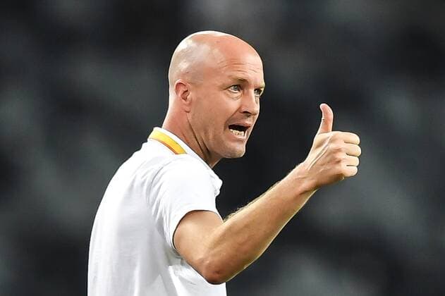 Head coach Jordi Cruyff of Chongqing SWM celebrates as he watches his players competing against Shenzhen F.C. in their 18th round match during the 2019 Chinese Football Association Super League (CSL) in Shenzhen city, south China s Guangdong province, 17 July 2019. Chongqing SWM defeated Shenzhen F.C. 2-0. Chongqing SWM slashes Shenzhen FC at 18th round match of 2019 CSL  711454997600796677