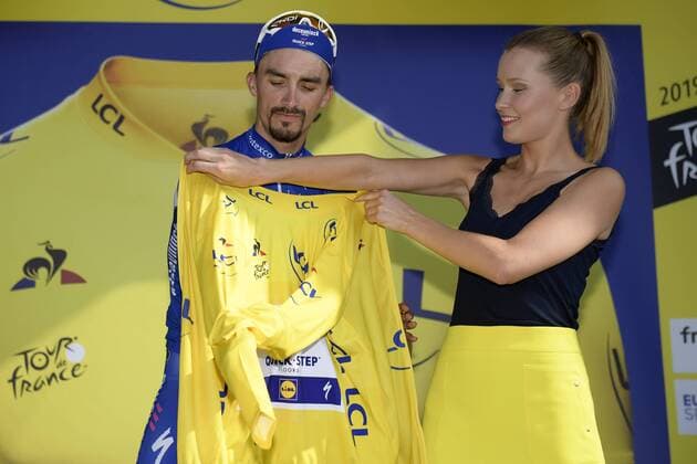 French Julian Alaphilippe of Deceuninck - Quick-Step celebrates on the podium in the yellow jersey of leader in the overall ranking after stage 16 of the 106th edition of the Tour de France cycling race, from and to Nimes (177 km), France, Tuesday 23 July 2019. This year s Tour de France starts in Brussels and takes place from July 6th to July 28th. YORICKxJANSENS  x05632310x