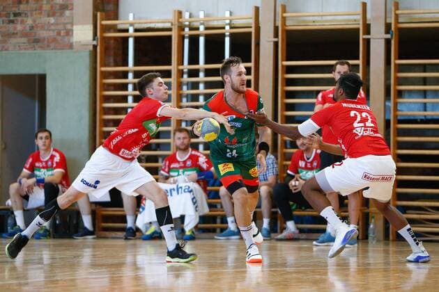 23 07 2019, xtgx, Handball test match, SC Magdeburg TV Huettenberg emspor, v l Simon Belter TVH , Christian O Sullivan Magdeburg, 24 , Mubenzem Dieudonne TVH duel, fight, tackle Schoenebeck
