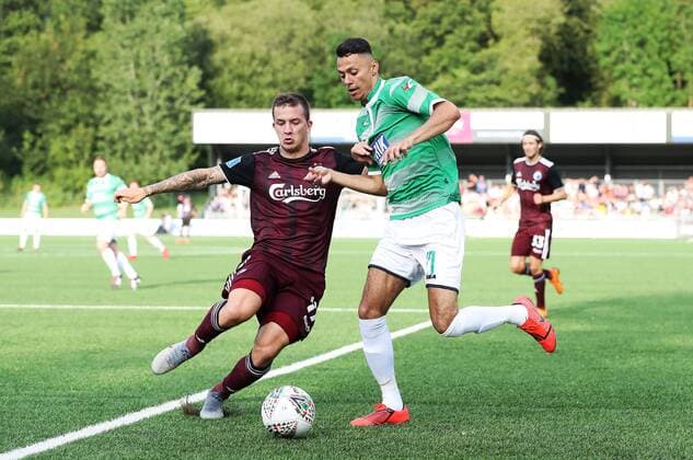 Copenhagen s Karlo Bartolec left and The New Saints Dean Ebbe battle for the ball during the UEFA Champions League second qualifying round first leg match at Park Hall Stadium, Oswestry , Oswestry Denmark,  Copyright: PAxWire PAxImages MartinxRickettx cop333 spdk20190723-201427-L