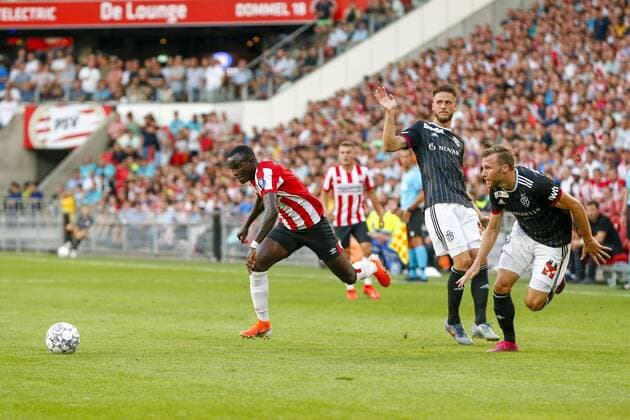 EINDHOVEN, 23-07-2019, Champions League preliminary round. Season 2019-2020. Philips Stadion. PSV - Basel. PSV midfielder Bruma (Armindo Tue Na Bangna) (L) and Basel player Ricky van Wolfswinkel (C) and Basel player Silvan Widmer (R) during the game PSV - Basel. PSV - Basel  x3962855x Copyright: