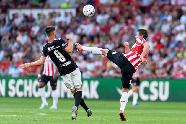 Eindhoven, Netherlands, 24 07 2019, UEFA Champions League, Second qualifying round, PSV Eindhoven FC Basel , Ricky van Wolfswinkel Basel and Nick Viergever PSV in the duel, battle for the ball Defodi 01001216538 Defodi-001