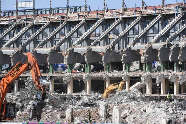 July 23, 2019 - Madrid, Spain - Workers clean up debris as demolition continues at the Vicente Calderon in Atletico de Madrid old stadium..Vicente Calderon stadium was named after the club™s former president and it was opened in October 1966 in the south of the city, on the Manzanares River. It has hosted the Atletico de Madrid™s matches for over 50 years, until their move to the Wanda Metropolitano in 2017. Vicente Calderon Stadium Demolition in Madrid, Spain - 23 Jul 2019 - ZUMAs197 20190723_zaa_s197_008 Copyright: xJohnxMilnerx