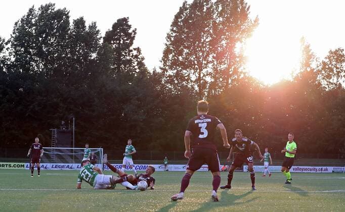 The New Saints Aeron Edwards and Copenhagen s Carlo Holse battle for the ball during the UEFA Champions League second qualifying round first leg match at Park Hall Stadium, Oswestry , Oswestry Denmark,  Copyright: PAxWire PAxImages MartinxRickettx cop333 spdk20190723-214032-L