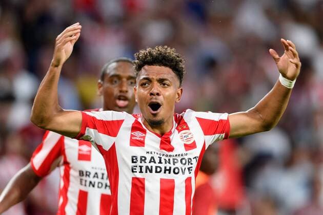 Eindhoven, Netherlands, 24 07 2019, UEFA Champions League, Second qualifying round, PSV Eindhoven FC Basel , Donyell Malen PSV goal cheer, celebrates after scoring his goal to 3 2, his team celebrates after scoring s third goal Defodi 01001216563 Defodi-001