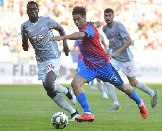 L-R Ousseynou Ba (Piraeus), Ales Cermak (Plzen) and Andreas Bouchalakis (Piraeus) in action during the Football Champions League 2nd qualifying round match: Viktoria Plzen vs Olympiakos Piraeus in Pilsen, Czech Republic, on July 23, 2019. (CTKxPhoto MiroslavxChaloupka) CTKPhotoP201907230965701  cha07