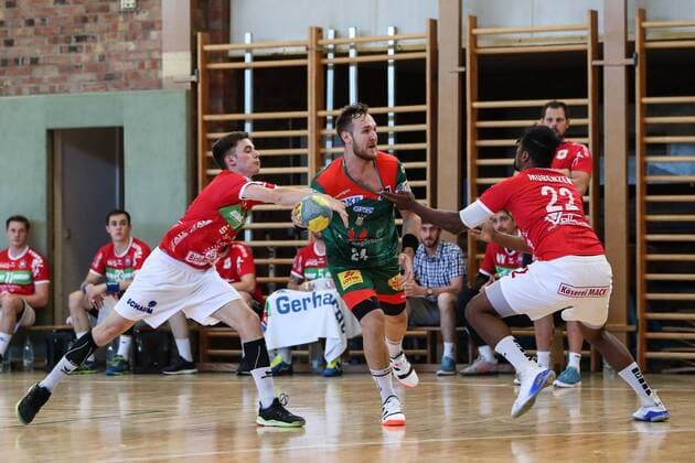 Christian O Sullivan SC Magdeburg vs. Dieudonne Mubenzem TV Hüttenberg Handball Test match Summer preparation Season 2019 2020 Points game SC Magdeburg vs. TV Hüttenberg in the Franz Vollbring Halle in Schönebeck Action,Germany, Handball, Man, Men,23 07 2019