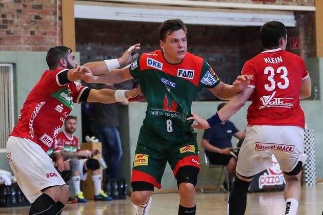 Christoph Steinert SC Magdeburg vs. Johannes Klein TV Hüttenberg Handball test game summer preparation season 2019 2020 points game SC Magdeburg vs. TV Hüttenberg in the Franz Vollbring Halle in Schönebeck Aktion,Deutschland, Handball, Mann, Maenner,23 07 2019