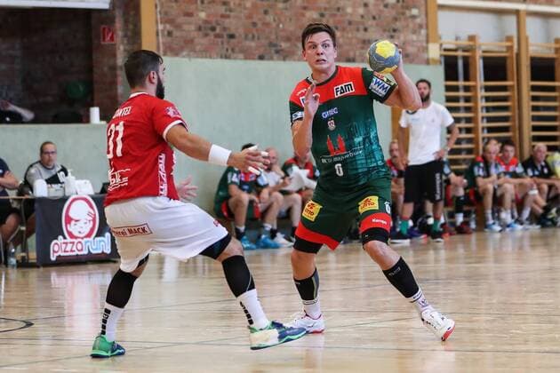 Christoph Steinert SC Magdeburg vs. Björn Zintel TV Hüttenberg Handball test game summer preparation season 2019 2020 points game SC Magdeburg vs. TV Hüttenberg in the Franz Vollbring Halle in Schönebeck Aktion,Deutschland, Handball, Mann, Maenner,23 07 2019