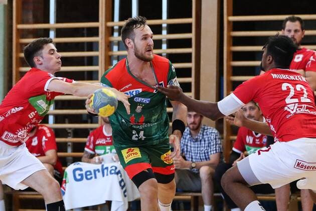 Christian O Sullivan SC Magdeburg vs. Dieudonne Mubenzem TV Hüttenberg Handball Test match Summer preparation Season 2019 2020 Points game SC Magdeburg vs. TV Hüttenberg in the Franz Vollbring Halle in Schönebeck Action,Germany, Handball, Man, Men,23 07 2019