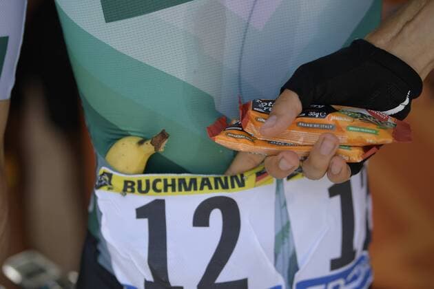 German Emanuel Buchmann of Bora-Hansgrohe puts snacks and a banana in his shirt at the start of stage 17 of the 106th edition of the Tour de France cycling race, from Pont du Gard to Gap (200 km), France, Wednesday 24 July 2019. This year s Tour de France starts in Brussels and takes place from July 6th to July 28th. YORICKxJANSENS  x05632624x