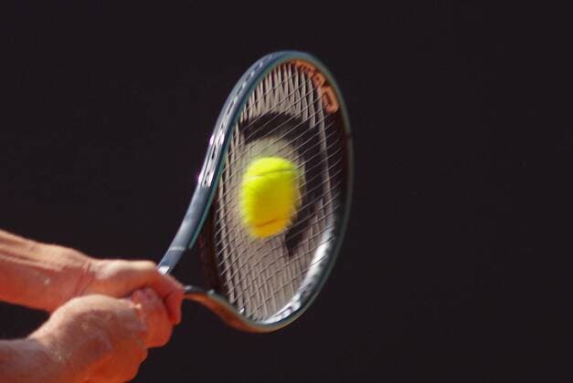Tennis, Hamburg European Open, Feature The ball is almost crushed when it hits the tensioned racket
