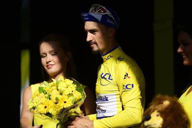 GAP, FRANCE - JULY 24 : ALAPHILIPPE Julian (FRA) of DECEUNINCK - QUICK - STEP pictured during the podium ceremony in the yellow jersey after stage 17 of the 106th edition of the 2019 Tour de France cycling race, a stage of 200 kms with start in Pont Du Gard and finish in Gap on July 24, 2019 in Gap, France, 24 07 2019 CYCLISME : Tour de France 2019 - Etape 17 - Pont Du Gard a Gap - 24 07 2019 PhotoNews Panoramic 