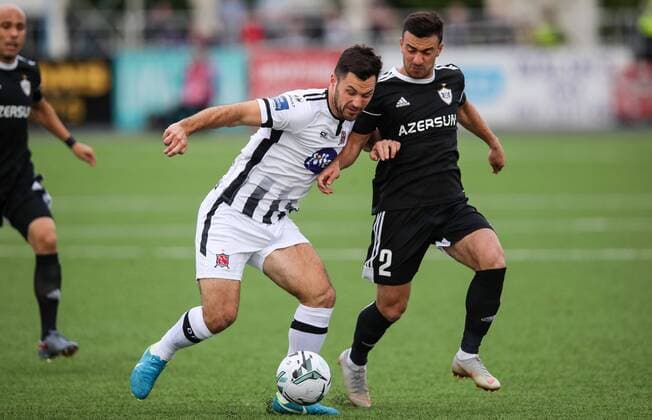 UEFA Champions League Second Qualifying Round First Leg, Oriel Park, Co. Louth 24 7 2019 Dundalk vs Qarabag Dundalk s Pat Hoban with Gara Garayev of Qarabag Pat Hoban with Gara Garayev 24 7 2019  Copyright: x©INPHO RyanxByrnex RB3_4846