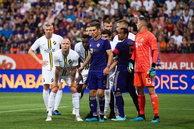 190724 Per Karlsson and Henok Goitom of AIK beside Blaz Vrhovec and goalkeeper Kenan Piric of Maribor during the UEFA Champions League qualifying match between Maribor and AIK on July 24, 2019 in Maribor Photo Martin Metelko BILDBYRAN Cop 277 bbeng fotball fotboll football kval till champions league soccer champions league qualification aik maribor,  Copyright: MARTINxMETELKO BB190724BB366