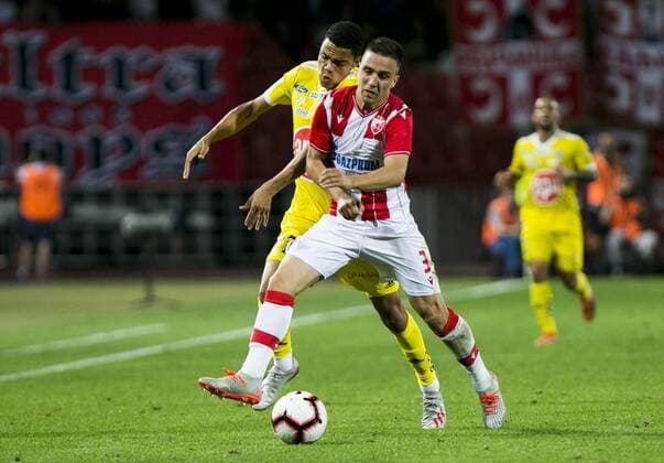 24th July 2019; Rajko Mitic Stadium, Belgrade, Serbia; UEFA Champions League Qualifying Second Leg First Round Red Star Belgrade versus HJK Helsinki; Kouassivi-Benissan of HJK Helsinki held off by Jovicic of Red Star Belgrade  ActionPlus12156300 NikolaxKrstic
