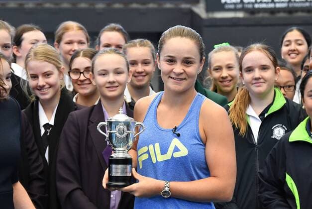 ASHLEIGH BARTY WELCOME HOME CEREMONY, French Open winner and world number one tennis player Ashleigh Barty (centre) is seen holding the French Open trophy after being welcomed home at Pat Rafter Arena in Brisbane, Thursday, July 25, 2019. Queensland Premier Annastacia Palaszczuk and 70 junior tennis players officially welcomed home Ashleigh Barty to Australia after her recent French Open win. ( NO ARCHIVING, EDITORIAL USE ONLY, NO USE IN BOOKS WITHOUT CONSENT Brisbane QUEENSLAND AUSTRALIA  Copyright: xDARRENxENGLANDx 20190725001410443033