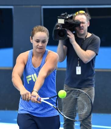 ASHLEIGH BARTY WELCOME HOME CEREMONY, French Open winner and world number one tennis player Ashleigh Barty (left) is seen being filmed by a television cameraman after she was welcomed home at Pat Rafter Arena in Brisbane, Thursday, July 25, 2019. Queensland Premier Annastacia Palaszczuk and 70 junior tennis players officially welcomed home Ashleigh Barty to Australia after her recent French Open win. ( NO ARCHIVING, EDITORIAL USE ONLY, NO USE IN BOOKS WITHOUT CONSENT Brisbane QUEENSLAND AUSTRALIA  Copyright: xDARRENxENGLANDx 20190725001410445258