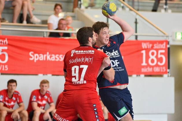 Joshua Stoeffler SG H2Ku Herrenberg 32 against Jonathan Fischer SG BBM Bietigheim 97 Handball , men , preparation , tournament, Altensteig , S Cup , 27 07 2019, photo TBaur Eibner S Cup SG H2Ku Herrenberg SG BBM Bietigheim Altensteig Copyright: xEIBNER TobiasxBaurx EP_TBR