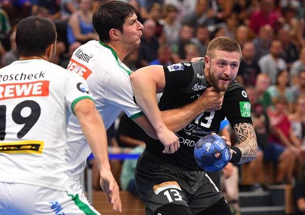 from right Mindaugas Dumcius Dresden against Marco Mamic and Bastian Roscheck both Leipzig, HC Elbflorenz Dresden against SC DHfK Leipzig, test match, friendly match, handball, 2 League of Men, 2 Bundesliga, season 2019 2020, Dresden, BallsportARENA Dresden, 27 07 2019,