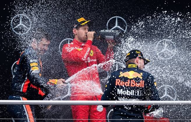 28 07 2019, xpsx, Motorsport FIA Formula 1, Mercedes Benz Grand Prix of Germany 2019 race v l award ceremony, podium, cheering, Sebastian Vettel Scuderia Ferrari Mission Winnow 5 GER , Max Verstappen Aston Martin Red Bull Racing 33 NED Hockenheim