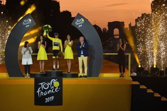 Winner Colombian Egan Bernal of Team Ineos celebrates on the podium in the yellow jersey of leader in the overall ranking after the final stage of the 106th edition of the Tour de France cycling race, from Rambouillet to Paris Champs-Elysees (128km), France, Sunday 28 July 2019. This year s Tour de France starts in Brussels and takes place from July 6th to July 28th. DAVIDxSTOCKMAN  x05635261x