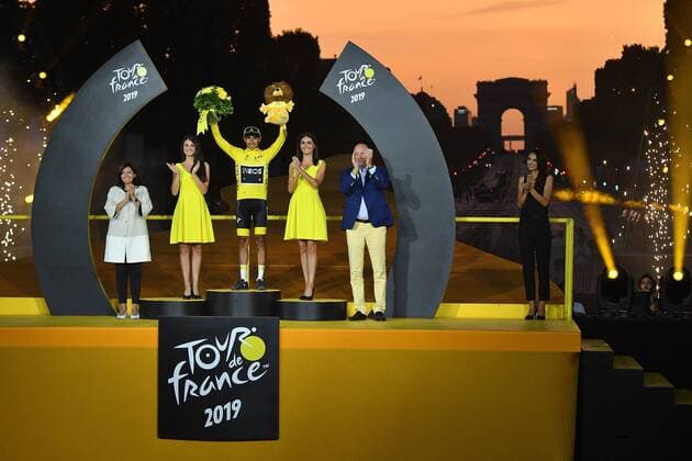 Colombian Egan Bernal of Team Ineos celebrates on the podium in the yellow jersey of leader in the overall ranking after the final stage of the 106th edition of the Tour de France cycling race, from Rambouillet to Paris Champs-Elysees (128km), France, Sunday 28 July 2019. This year s Tour de France starts in Brussels and takes place from July 6th to July 28th. DAVIDxSTOCKMAN  x05635332x