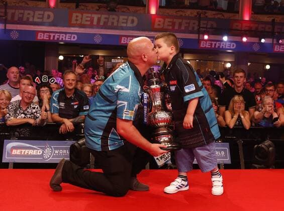 Sport Themen der Woche KW30 Sport Bilder des Tages 28th July 2019, Empress Ballroom Winter Gardens Blackpool; 2019 Betfred World Matchplay Darts; Final; Rob Cross (ENG) and his son with the World Matchplay trophy after his victory over Michael Smith (ENG)  ActionPlus12157119 AlanxMartin