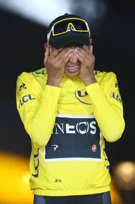 Egan Bernal of Colombia reacts at the presentation ceremony after winning the Tour de France in Paris on Sunday, July 28, 2019. Bernal claimed his first Tour de France victory, becoming the youngest winner of the race in the post-war era.  PAR20190728709 DAVIDxSILPA