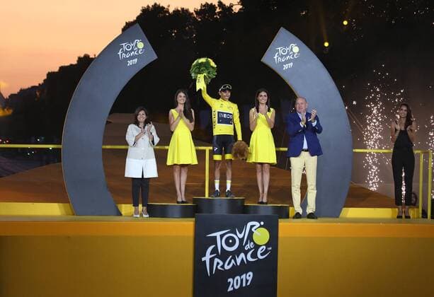 Egan Bernal of Colombia attends the presentation ceremony after winning the Tour de France in Paris on Sunday, July 28, 2019. Bernal claimed his first Tour de France victory, becoming the youngest winner of the race in the post-war era.  PAR20190728722 DAVIDxSILPA