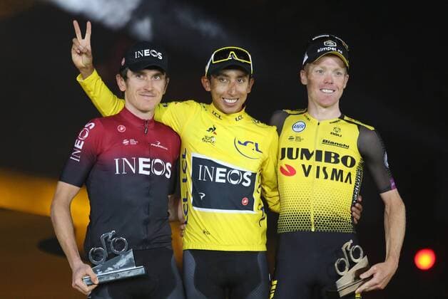 Geraint Thomas of United Kingdom (L), Egan Bernal of Colombia (C) and Steven Kruijswijk of The Netherlands attend the presentation ceremony after the Tour de France in Paris on Sunday, July 28, 2019. Bernal claimed his first Tour de France victory, becoming the youngest winner of the race in the post-war era.  PAR20190728727 DAVIDxSILPA