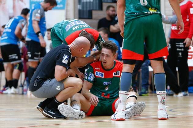 30 07 2019, xtgx, Handball test game, SC Magdeburg Talent Robstav M A T Plzen emspor, v l Michael Damgaard Magdeburg, 34 injured Halle Saale