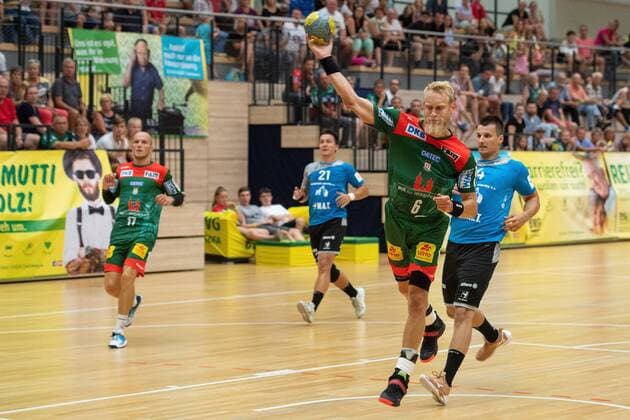 Matthias Musche SC Magdeburg once again overcomes the goalkeeper of Pilsen SC Magdeburg vs. MAT Pilsen at the BWG Handballtag in the Erdgas Sportarena Halle Saale Sachsen Anhalt Germany