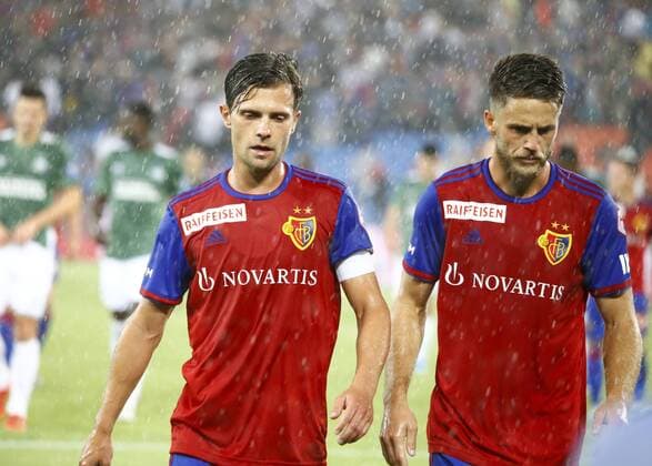 30 07 2019 Basel , Football Men UEFA Champions League Qualification Season 2019 2020 FC Basel PSV Eindhoven In the picture Valentin Stocker I and Ricky van Wolfswinkel FC Basel im Regen