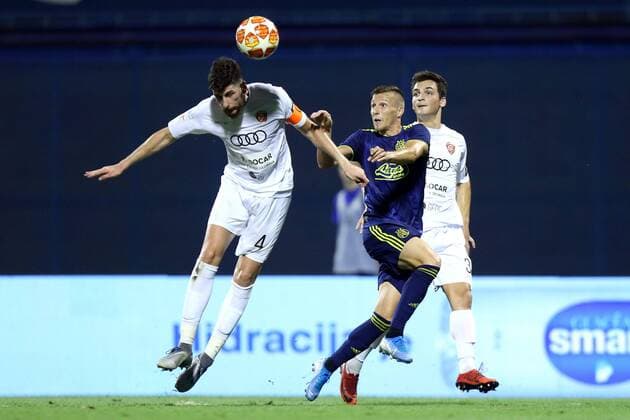 (190731) -- ZAGREB, July 31, 2019 -- Mislav Orsic (C) of GNK Dinamo Zagreb vies with Gagi Margvelashvili (L) of FC Saburtalo during the second leg of second qualifying round match of UEFA Champions League in Zagreb, Croatia, July 30, 2019. GNK Dinamo won 3-0. ( Pixsell via Xinhua) (SP)CROATIA-ZAGREB-UEFA CHAMPIONS LEAGUE-DINAMO ZAGREB VS SABURTALO TBILISI LukaxStanzl 