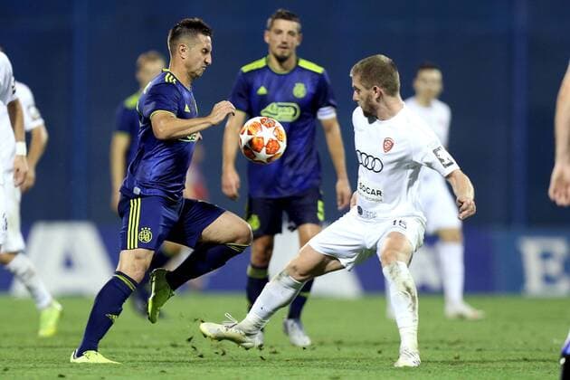 (190731) -- ZAGREB, July 31, 2019 -- Mario Gavranovic (L) of GNK Dinamo Zagreb vies with Dachi Tsnobiladze of FC Saburtalo Tbilisi during the second leg of second qualifying round match of UEFA Champions League in Zagreb, Croatia, July 30, 2019. GNK Dinamo won 3-0. ( Pixsell via Xinhua) (SP)CROATIA-ZAGREB-UEFA CHAMPIONS LEAGUE-DINAMO ZAGREB VS SABURTALO TBILISI LukaxStanzl 